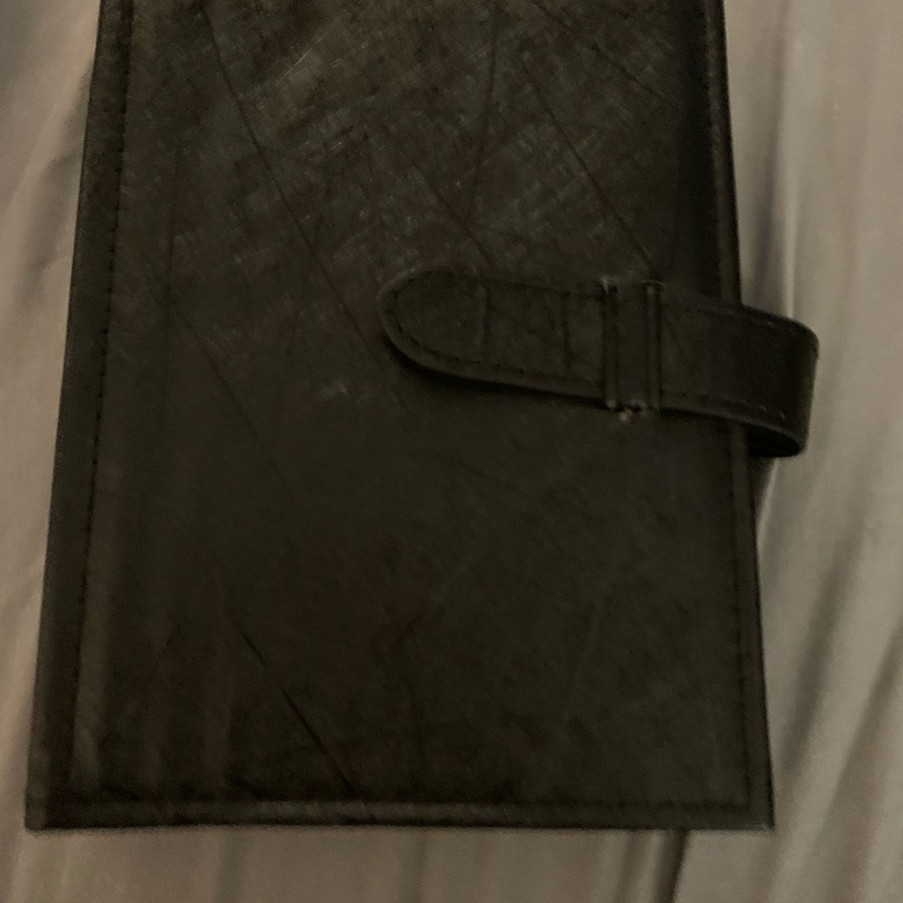 Black Womans Earring Holder Book